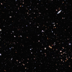 Image of a field of stars and galaxies.